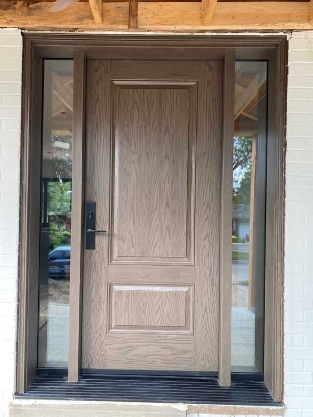 Fiberglass wood looking door installed in GTA